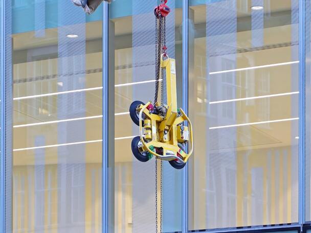  A medium size glass manipulator used for installing glass windows for a condominium building in the United States