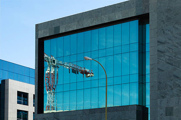 A high-reach mini crane with glass manipulator from Glass Manipulator Pros in the United States