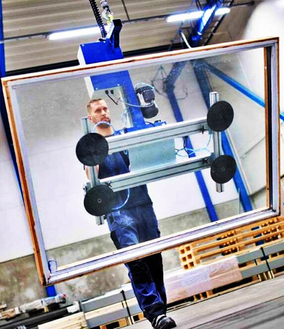 an operator using a glass manipulating equipment rented from Glass Manipulato Pros United States